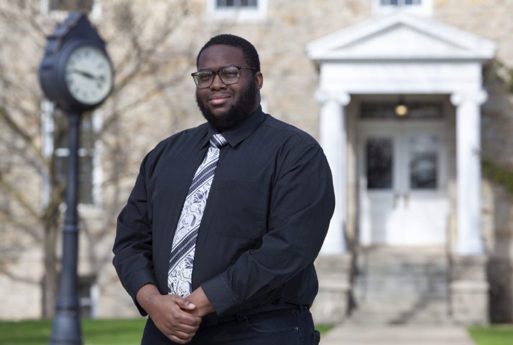Shaun Brown with Main Hall in the background  