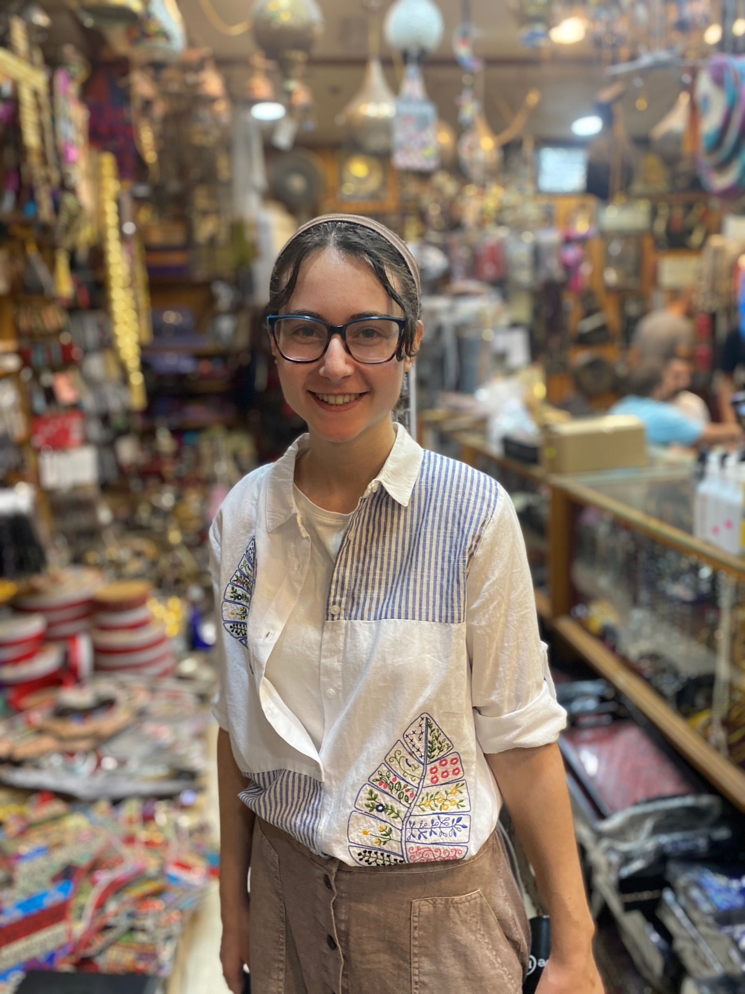 Sela Dombrower stands in a market in Amman, Jordan.