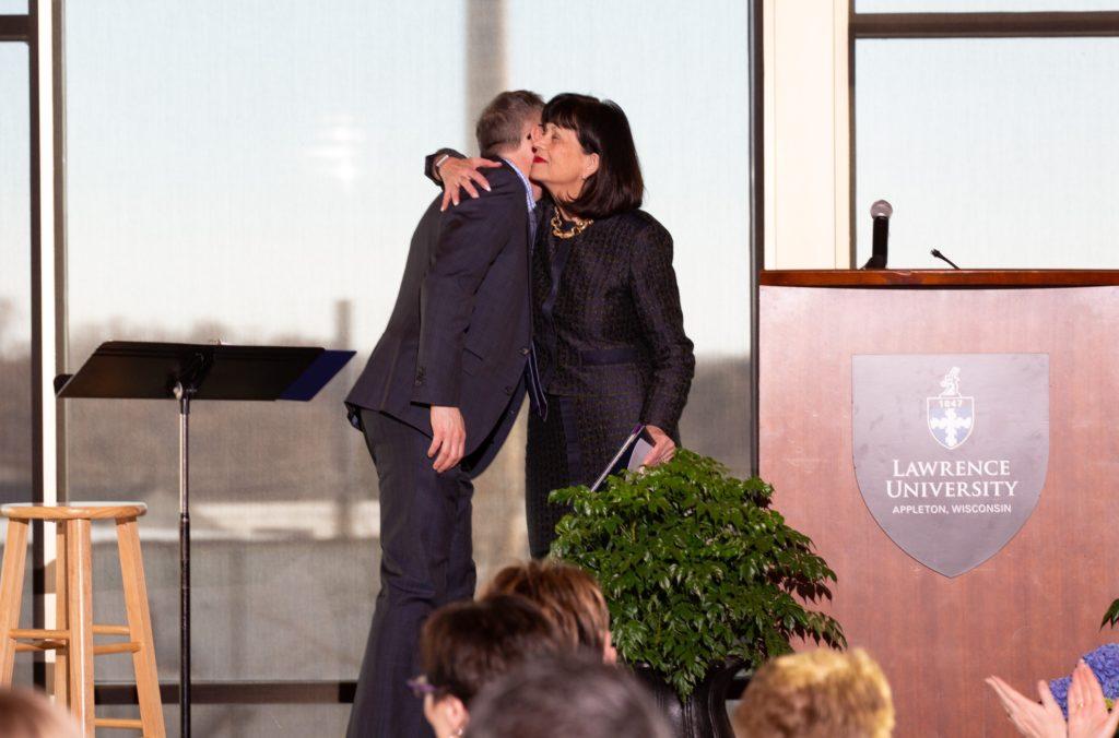 Lawrence University President Mark Burstein awards Cathie Tierney an honorary Bachelor of Liberal Studies degree at Tuesday’s Report to the Community.