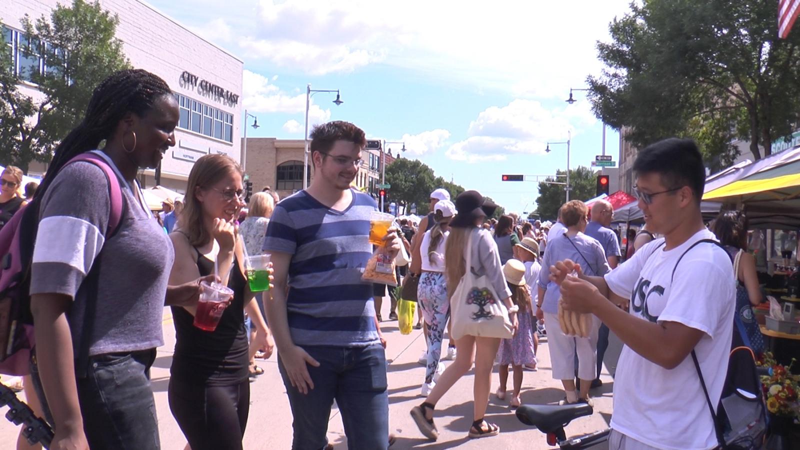 Students shop at Downtown Appleton Farm Market on a recent Saturday morning.