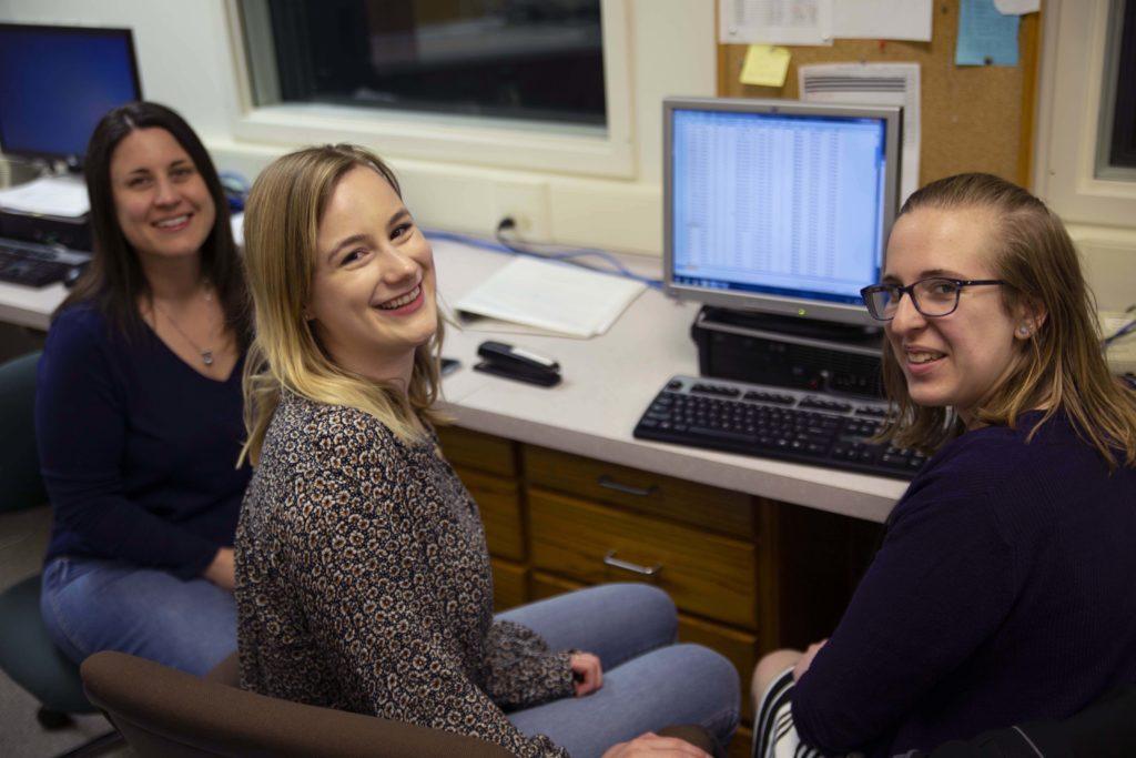 Associate Professor of Psychology Lori Hilt (left) working with psychology students 