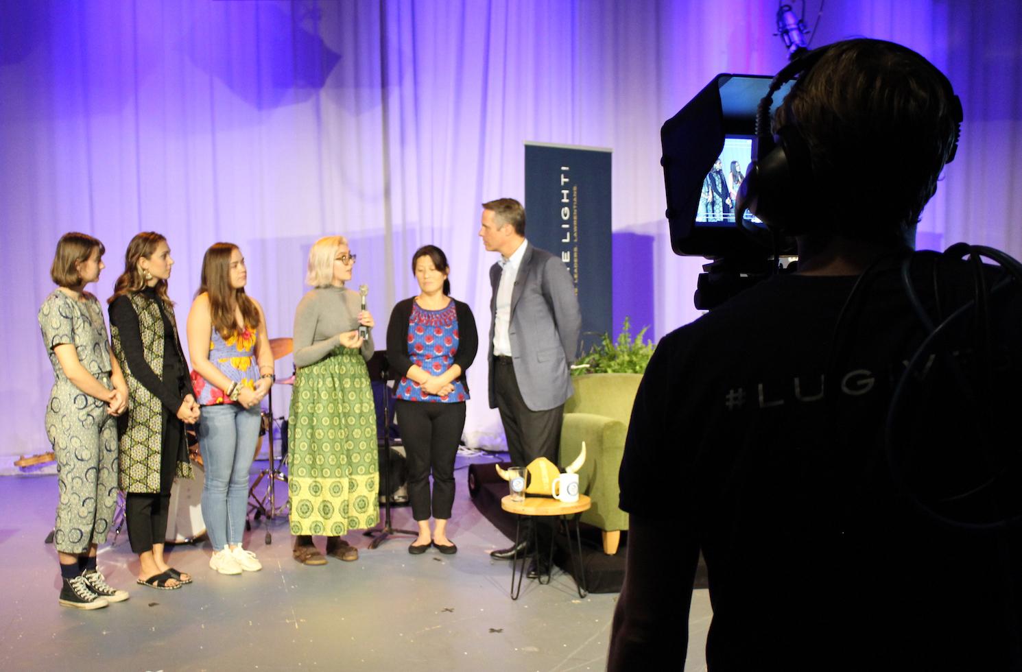 Giving Day webcast, host Terry Moran ’82 interviews Dominica Chang (far right) and the four Lawrence University students (from left) who studied abroad in Senegal 