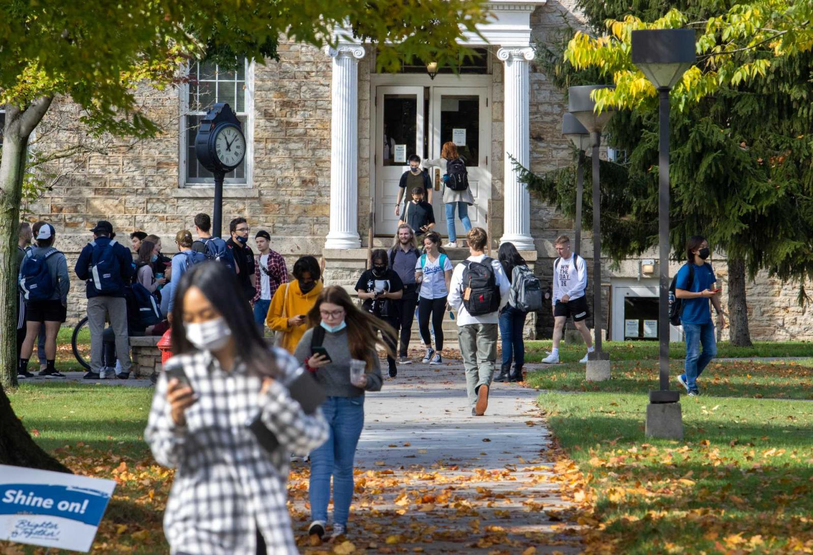 Students walking in and out of Memorial Hall as classes changes.