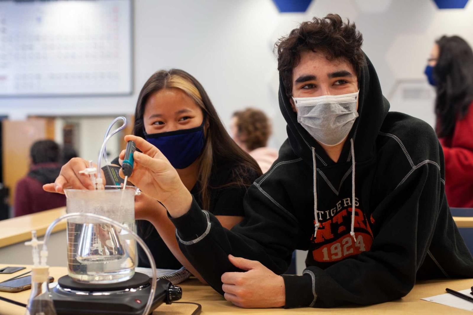 Katie Mahorney, a senior, and Dylan Delgado, a first-year work together on lab experiement during Introduction to Physics 