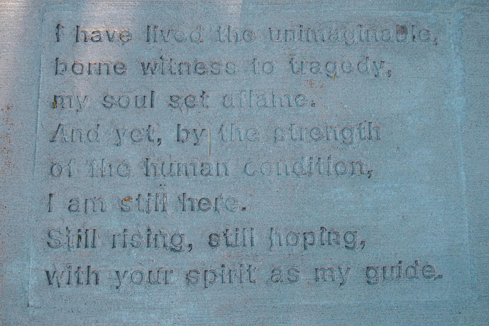 image of words carved into concrete