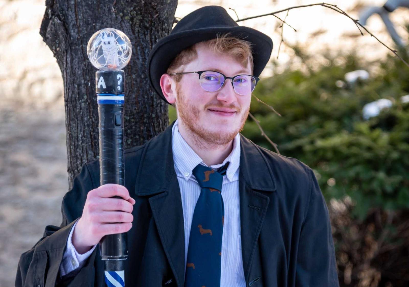 2022 Trivia Head Master Riley Newton poses for a photo on the Lawrence campus.