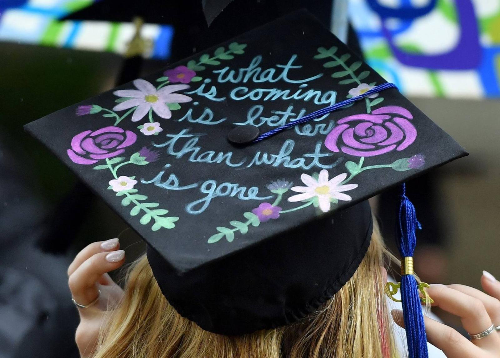 Decorated graduation cap that says, "what is coming is better than what is gone."