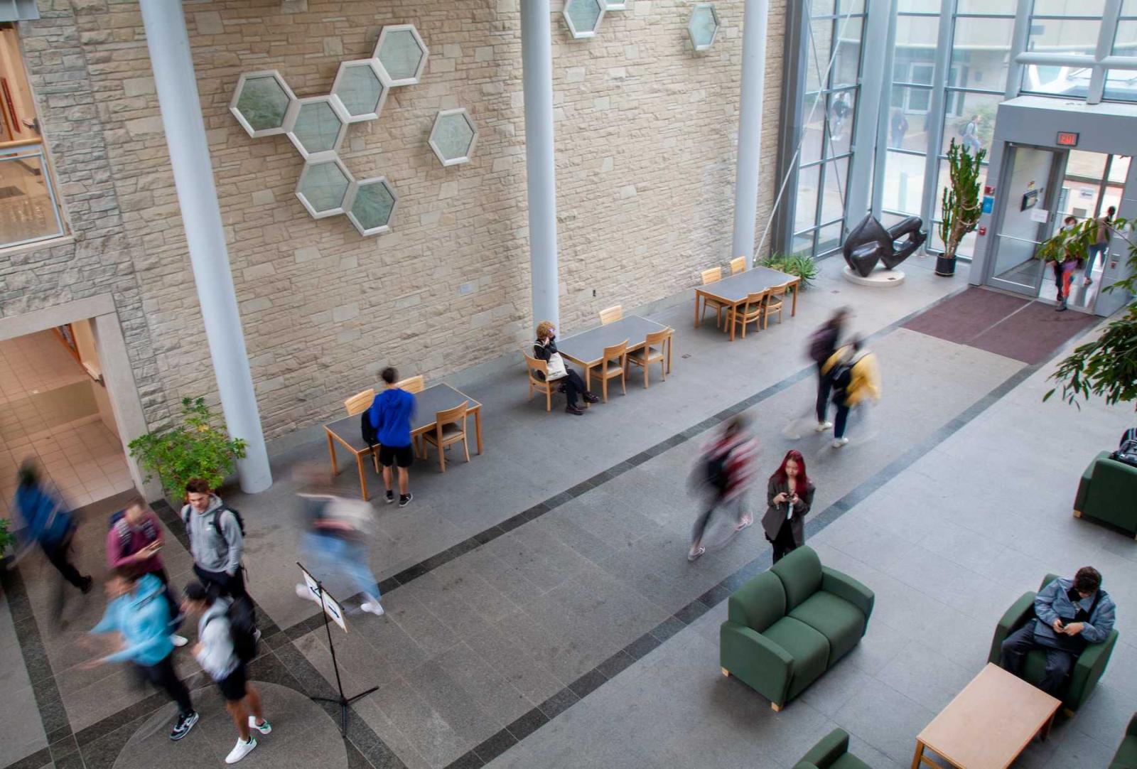 Students gather and move about in the Steitz atrium on first day of classes.