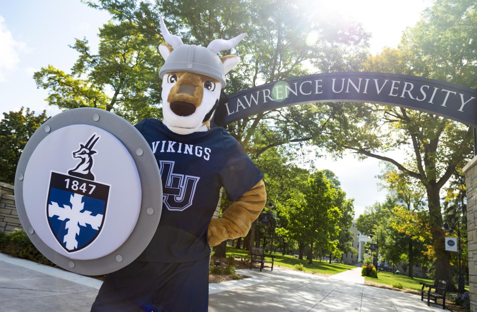 Blu, the Lawrence mascot, stands in front of the Lawrence Arch.