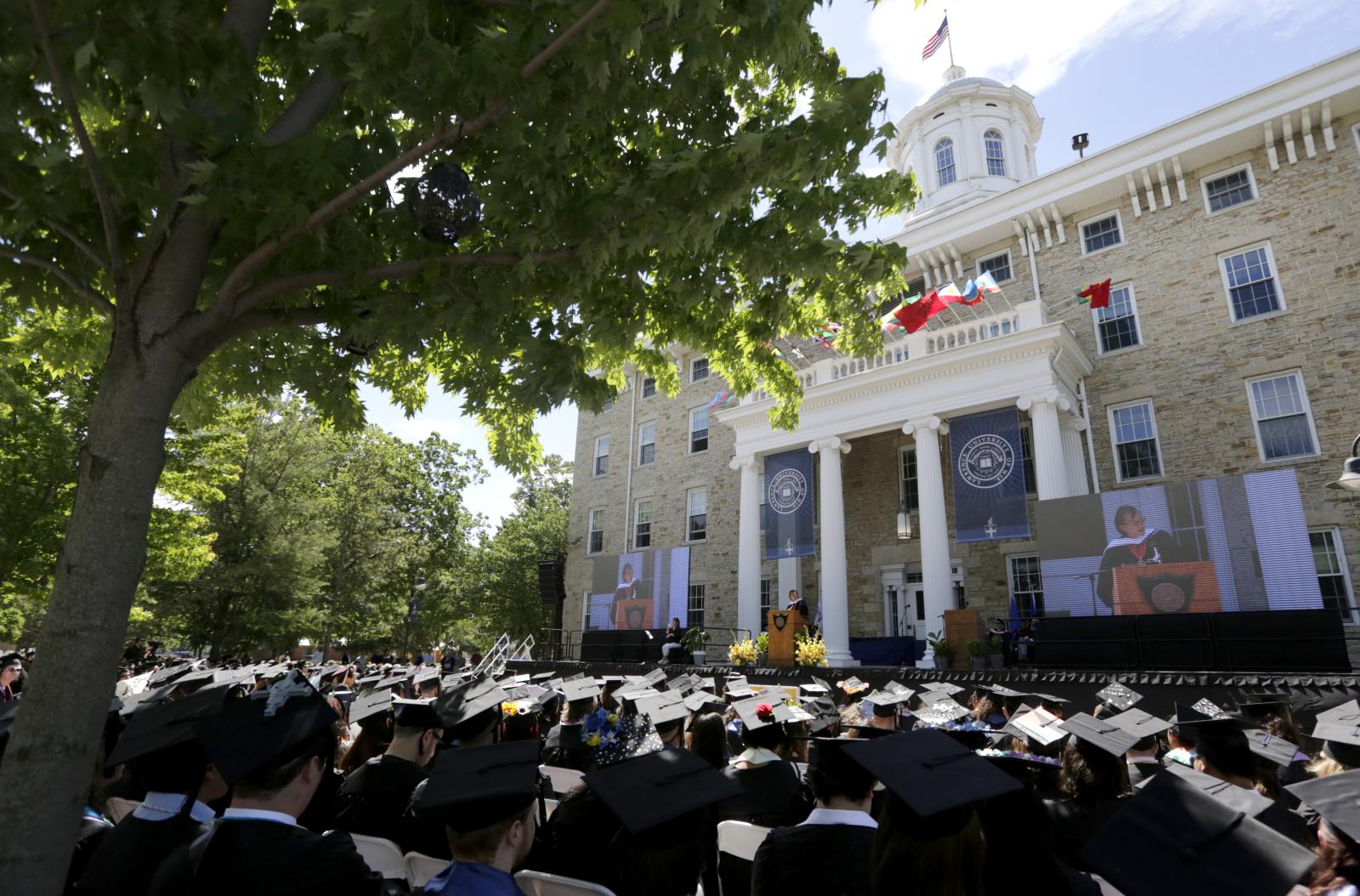 Pawo Choyning Dorji '06 addresses graduates and guests at Lawrence University's 2024 Commencement June 9 on Main Hall Green.