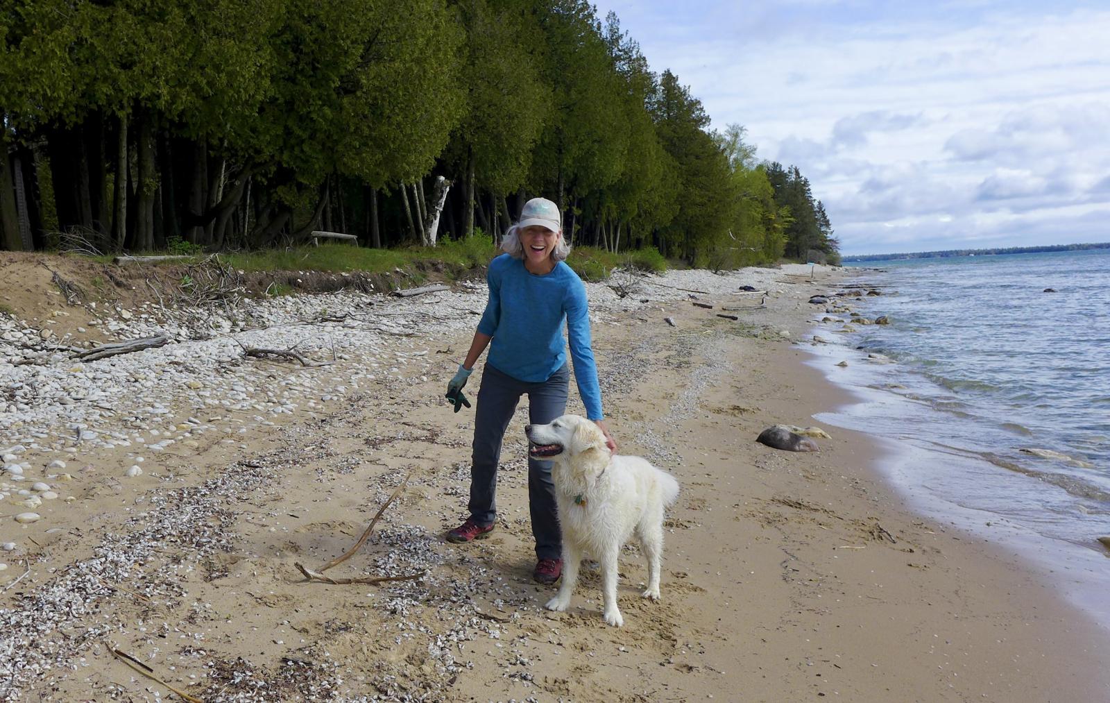 Stephanie Vrabec and her dog on the Bjorklunden beach