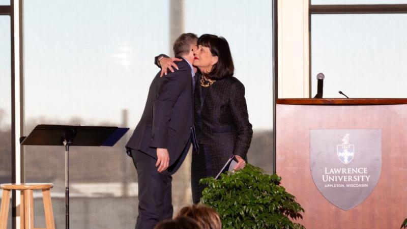 Lawrence University President Mark Burstein awards Cathie Tierney an honorary Bachelor of Liberal Studies degree at Tuesday’s Report to the Community.