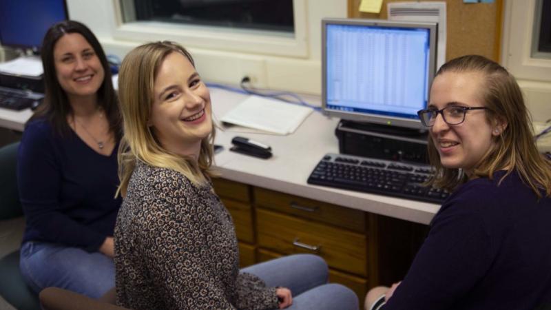 Associate Professor of Psychology Lori Hilt (left) working with psychology students 