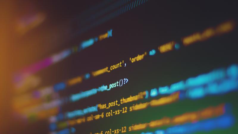Close up of web code displayed on a monitor