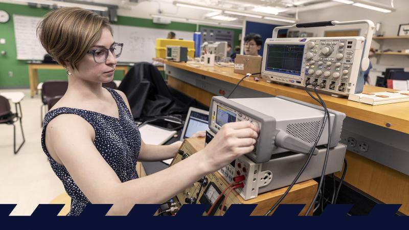 Student using lab equipment