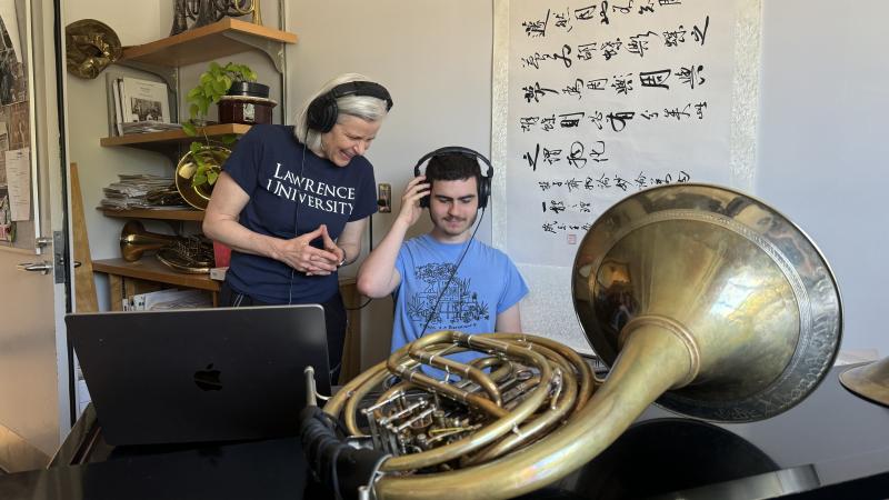 Ann Ellsworth and Leo Rodda listen to their edited tracks