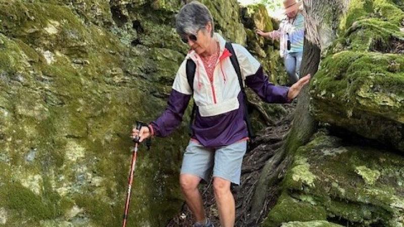 woman hiking near the ancient Lake Nipposing shoreline at Bjorklunden