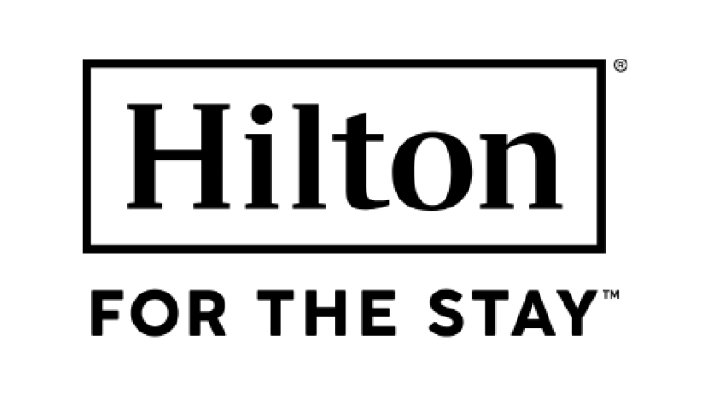 logo that reads Hilton For The Stay