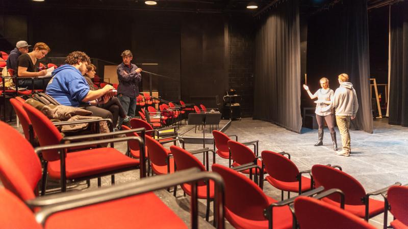 A group of people in a theater