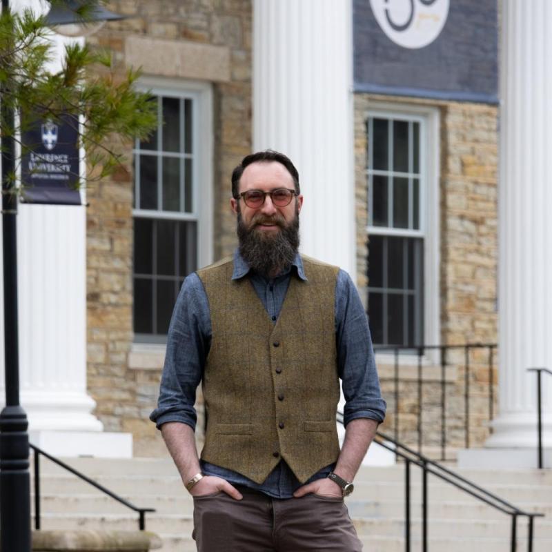 Dr. Kurt Wilson in front of Main Hall