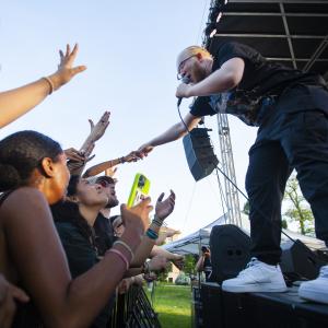 The band NOIR performs at LUaroo on Main Hall Green as Lawrence students cheer.