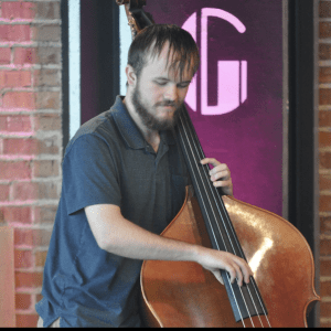Bassist Cooper Luedtke - Photo by Brian Pertl