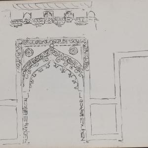 Pencil sketch of an ornate arched doorway with decorative trim and floral details. Additional small architectural sketches appear above the arch, and simple outline drawings suggest surrounding walls or building features. The drawing is on a plain white sheet of paper.